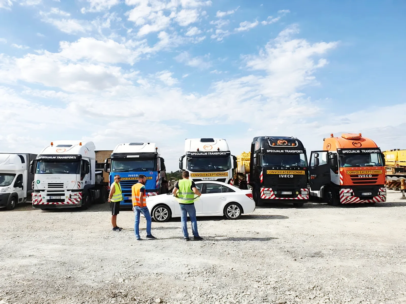Global Karavan fleet with the technical escort team in front of the tractor units